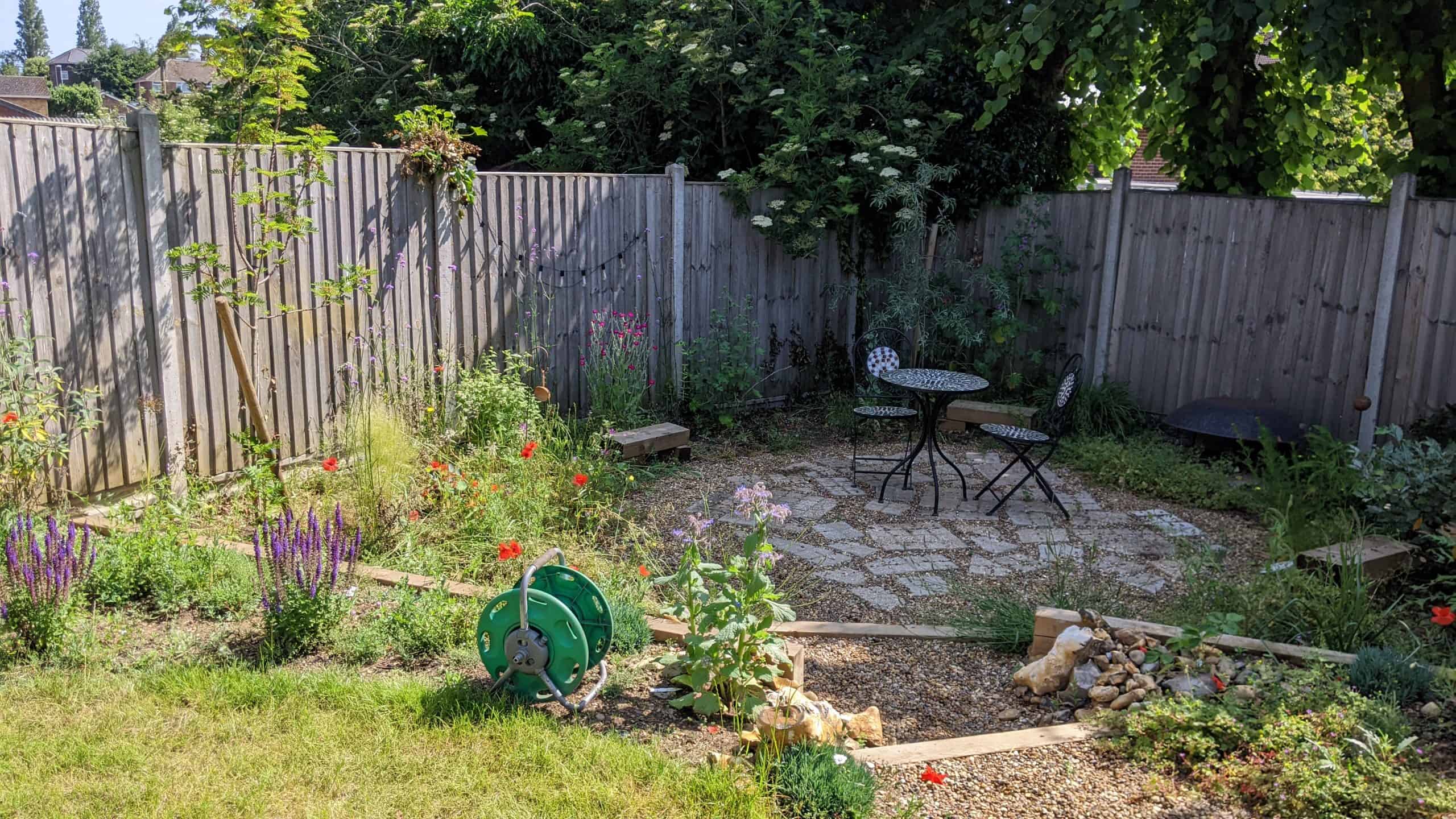 Finished seating area one year after completion by Richard Walters Garden Design Seating area one year after completion by Richard Walters